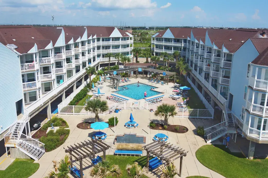 Aerial view of the resort pool courtyard at the Seascape complex, home of Condo 2208